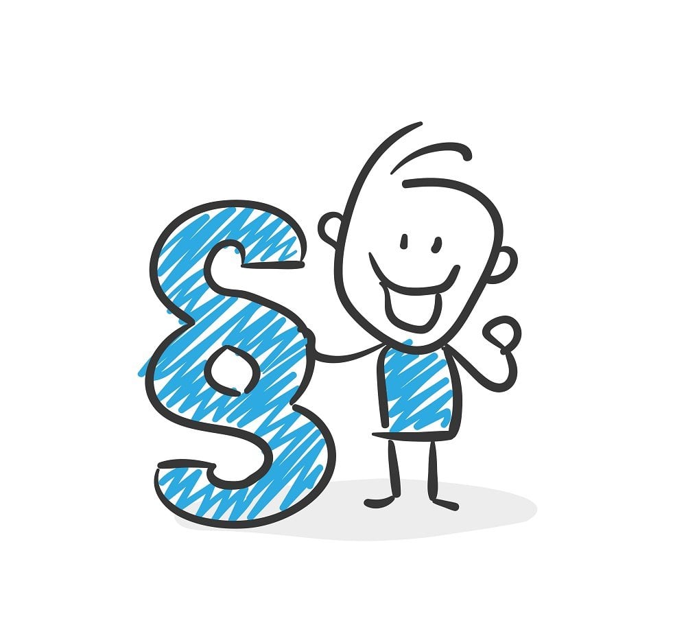 kind mit einem paragrapgenzeichen in der Hand